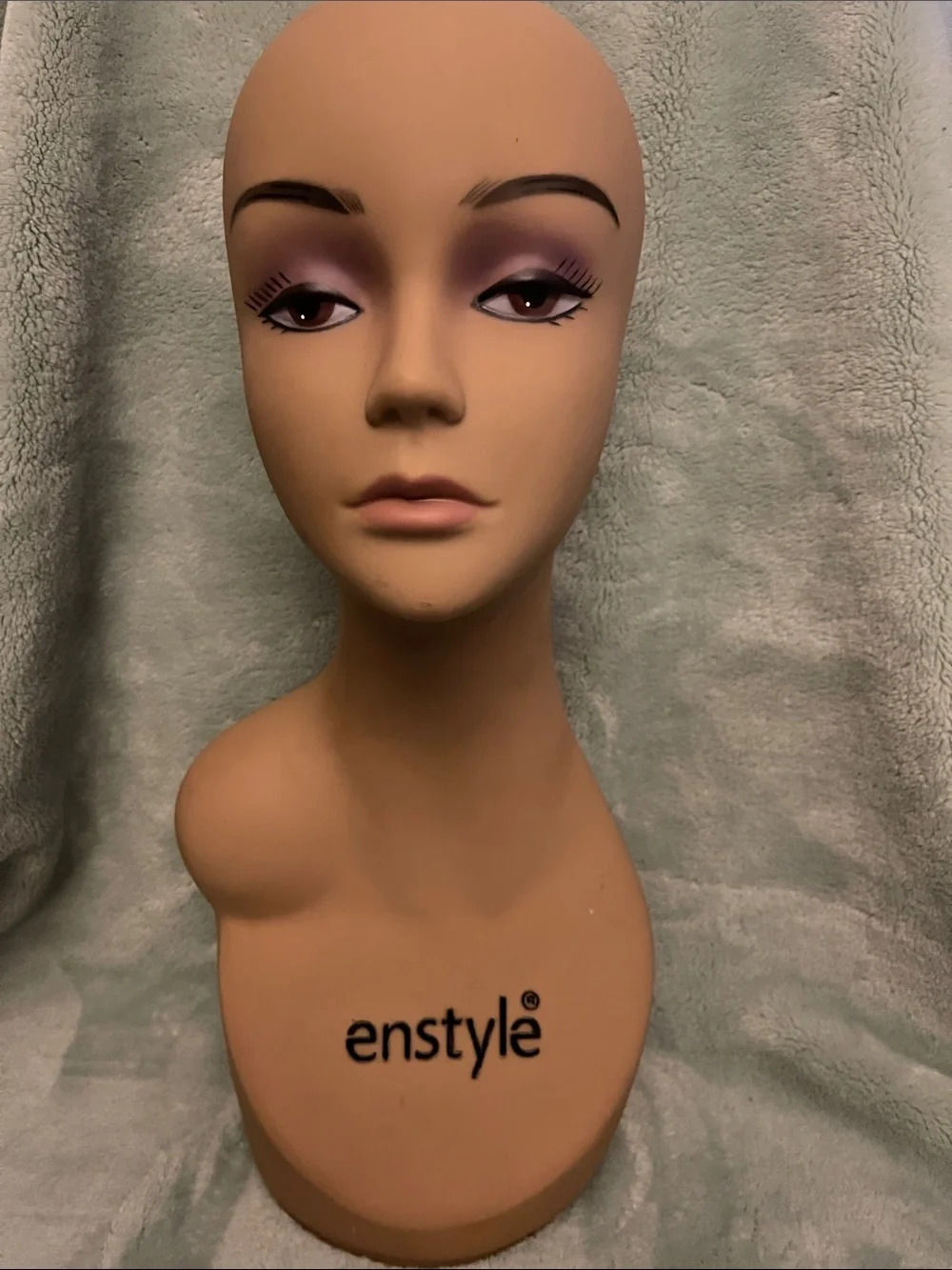 Tan Female Mannequin Head with Purple Makeup